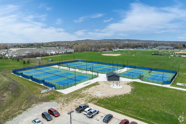 Students can play some tennis at KM Perform School For Arts And Performance.