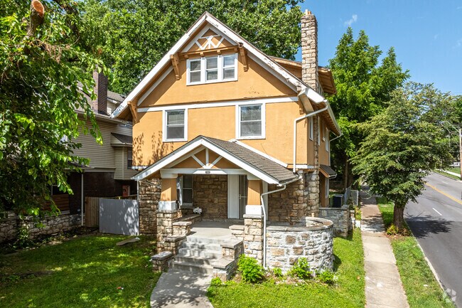 Tudor homes in Manheim Park sit on corner lots flanked by sidewalks on two sides.