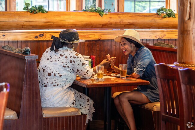 Village of Virginia Trace families enjoy food and conversations at RJ Gator's Florida Sea Grill.