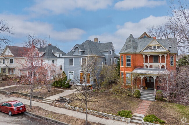 A Victorian home on the right in the Ventura Village neighborhood