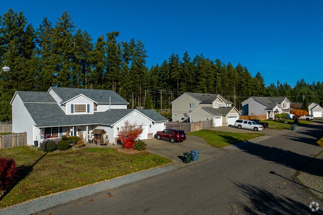 A row of traditional family homes in the Prairie Heights neighborhood.