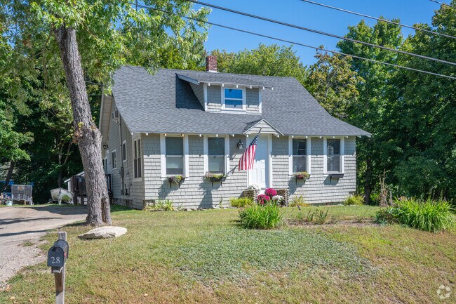 A bungalow home overlooks Mattanawcook Pond.