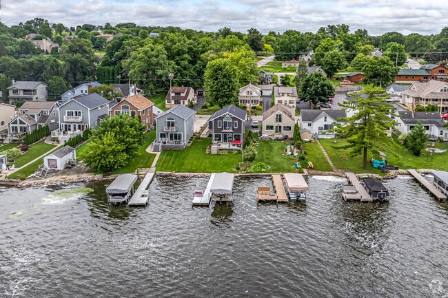 Find a single-family home with its own dock in Delafield Town.