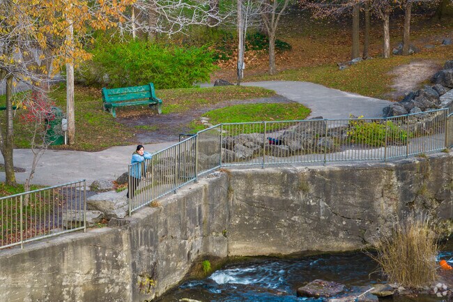 A woman enjoys the scenic view at a local park in Amherst, New York.