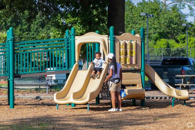 The Palmetto Park Playground offers equipment designed for children of all ages.
