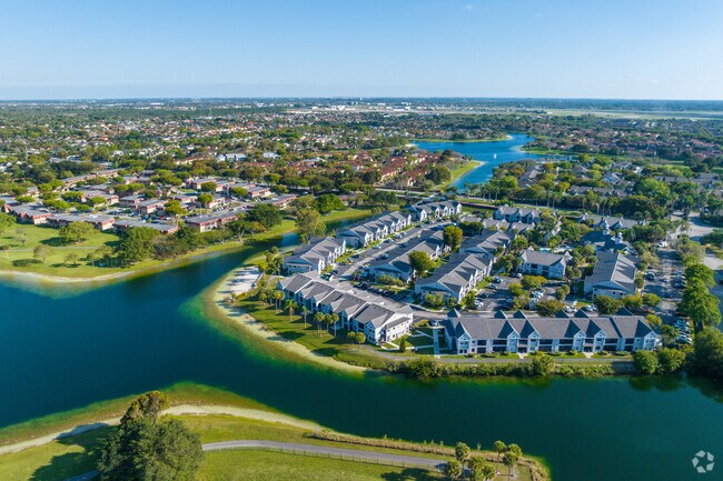 Waterfront homes line scenic canals in Kendale Lakes West neighborhoods.