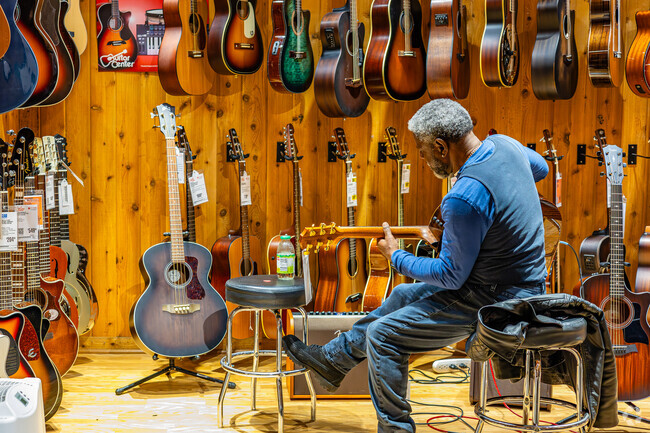 Local musicians love to jam out at the acoustic room inside Guitar Center near Chevrolet.