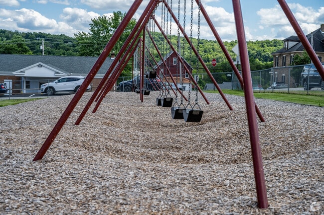 Young students at Shannock Valley Elementary School can swing during recess.