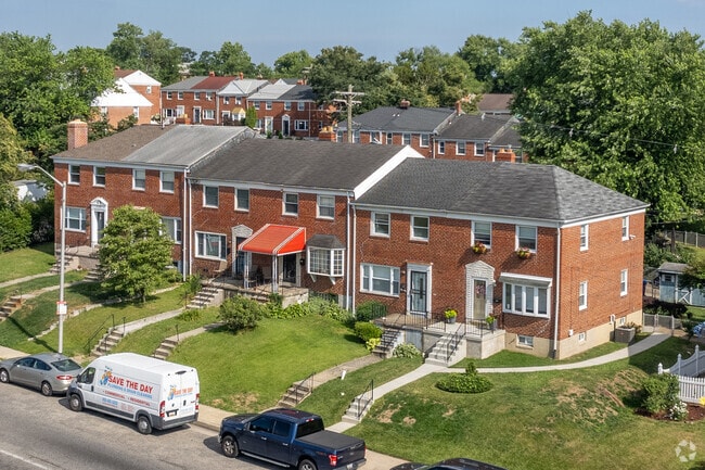 Most rowhomes in Glen Oaks have red brick facades.