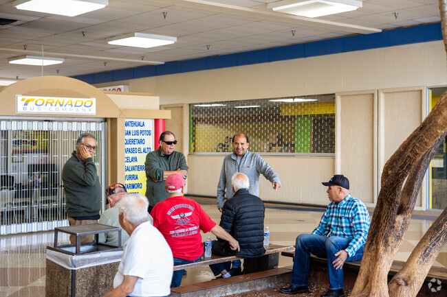 Old friends gather inside Belvidere Mall to catch up.