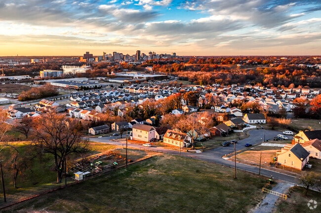 Set atop a hill, the Powhatan Playground is a perfect place to watch a sun set behind the City.