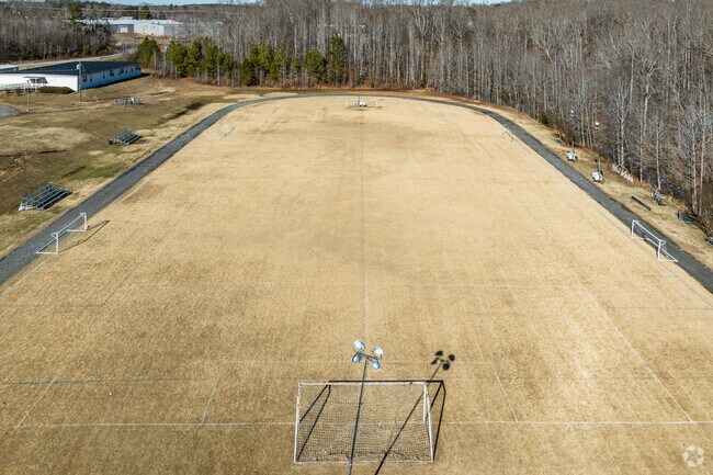 Clemmons Middle School features a soccer field accompanied by a track.