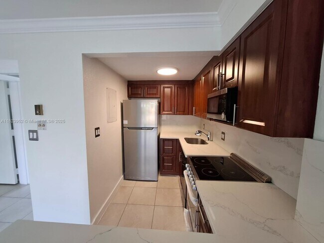 1650 NE 115th St unit 209, Miami, FL 33181 - photo 4