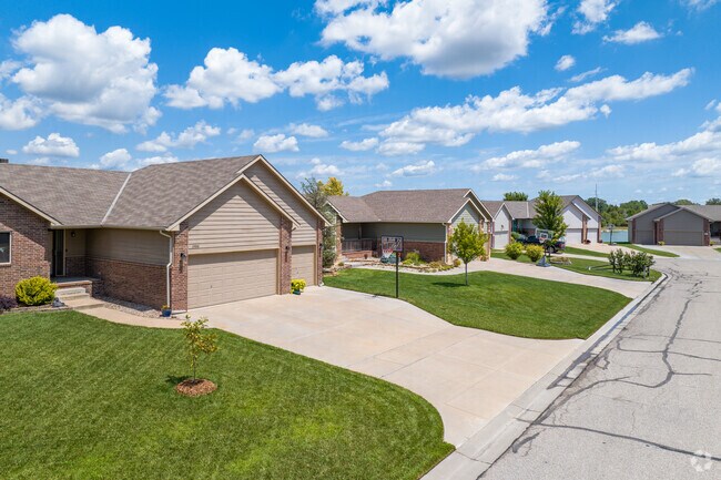 Many of the Modern Traditional homes in Northwest Wichita have red brick accents.