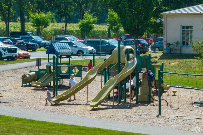 Kids enjoy Village Park's playground.
