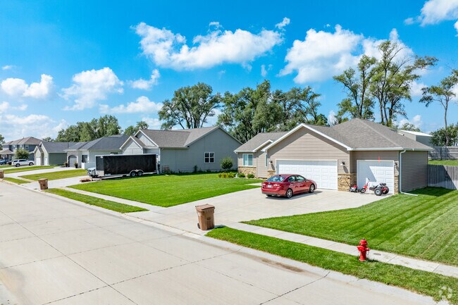 Large driveways lead to large homes in Ashland.