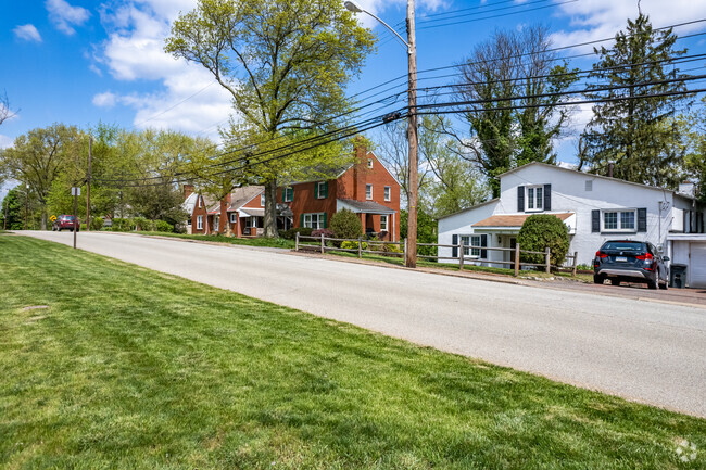 Green Tree homes sit on green lots with the trees of the area surrounding them.