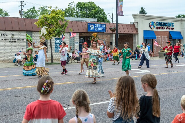 There are festive outfits and dances during the Morton Grove Fourth of July Parade.