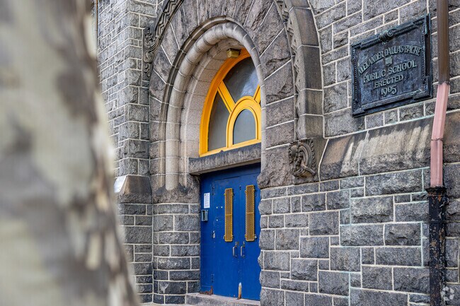 Bach-Martin School comprises two buildings featuring Romanesque and Georgian Revival styles.