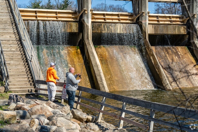 Residents of the Barton Plateau & Huron River Heights neighborhood fish at the base of the dam.