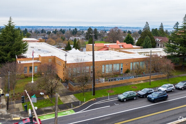 The Front entrance and play ground of Holy Redeemer Catholic School.