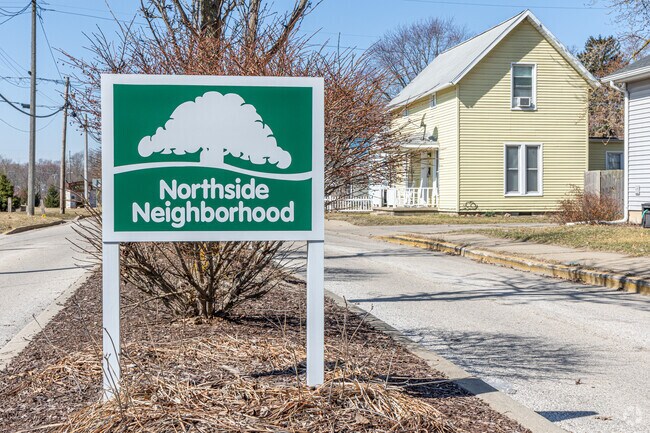 A sign welcomes visitors and residents to the Northside-Goshen neighborhood.