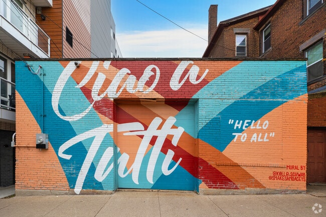 All who visit Cleveland Heights are welcomed by a vibrant mural created by Kelle Schwab.