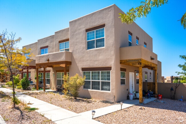 A row of Santa Fe Style townhomes found in Tierra Contenta.