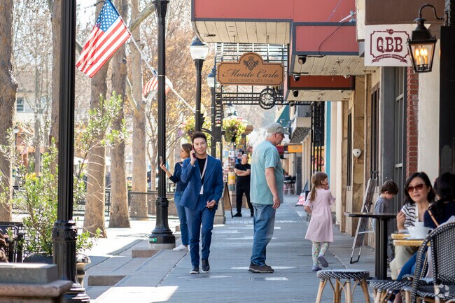 A businessman strolling around downtown Mountain View.