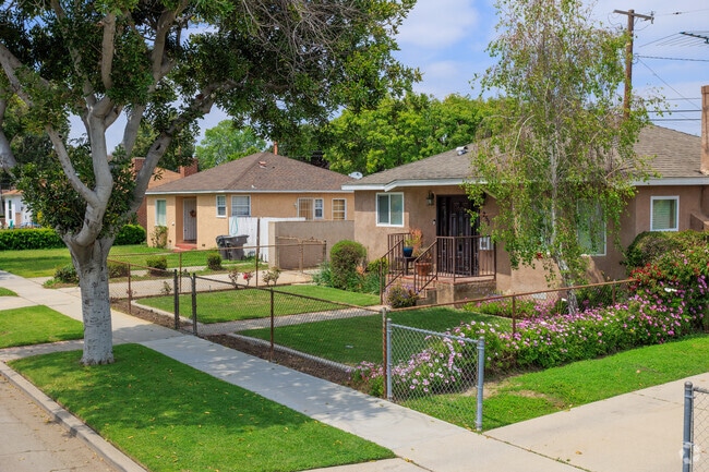 A typical quiet street with well maintained homes and yards.