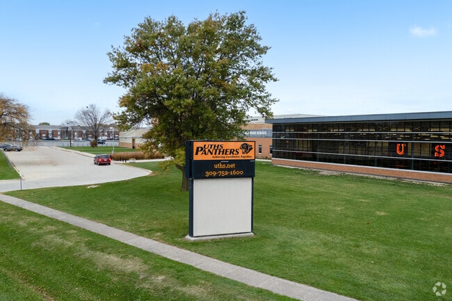 A look at the front of the school with the info board at United Township High School.