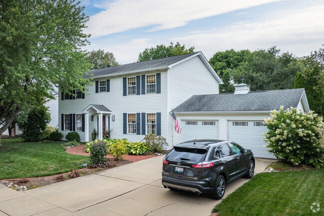 Koke Mill East has many colonial-style homes with attached garages.
