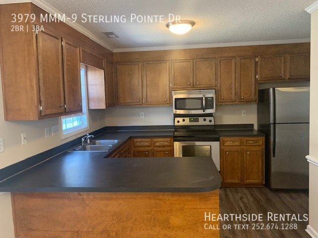 3979-MMM-9 Sterling Pointe Dr, Greenville, NC 28590 - photo 4