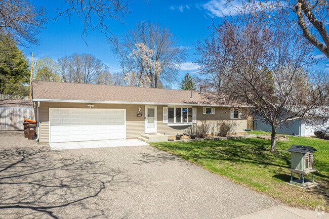 Large yards allow for extra-wide driveways and two-car garages in Oak Park Heights.