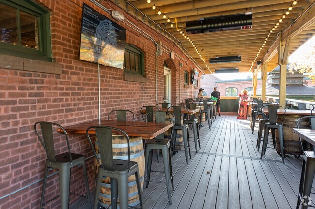 The outdoor seating area of Labyrinth Brewing Company offers alfresco warmth and comfort