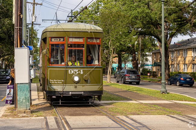 The iconic St. Charles Ave streetcar runs through the Garden District.
