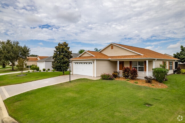 A beautiful row of cottage style homes in the Village of Tamarind Grove.