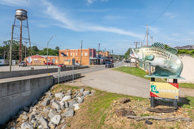Downtown Logansport, just minutes from Stanley, features charming signage and local flair.
