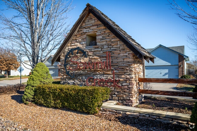 The entry for Sawmill Creek greets you with a large stone sign.