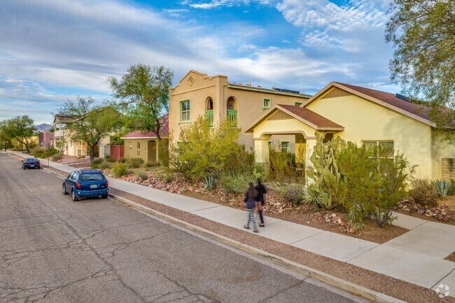 A row of adobe and tile single-family homes in Santa Rita Park.