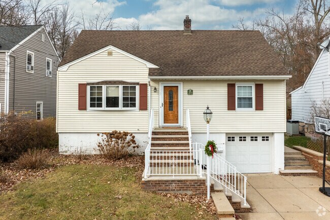 A charming Cape Cod home highlights the unique architecture of Packanack Lake, NJ.