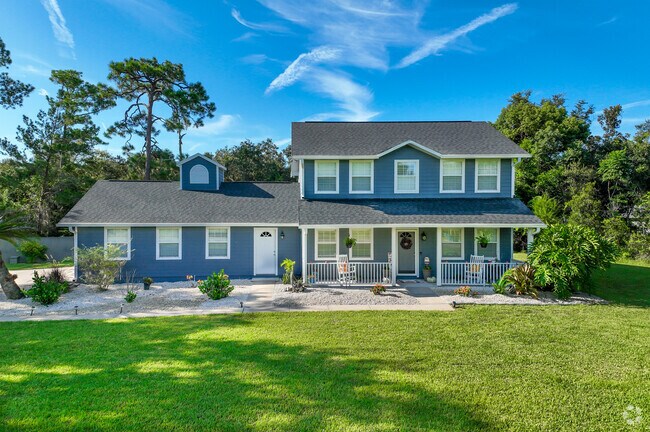 Beautiful two-story ranch style home in Village of Pine Run.