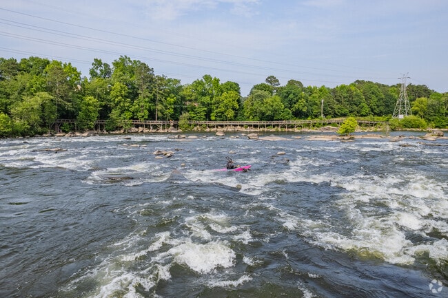 Saluda Riverwalk in Saint Andrews features rapids and scenic river views.