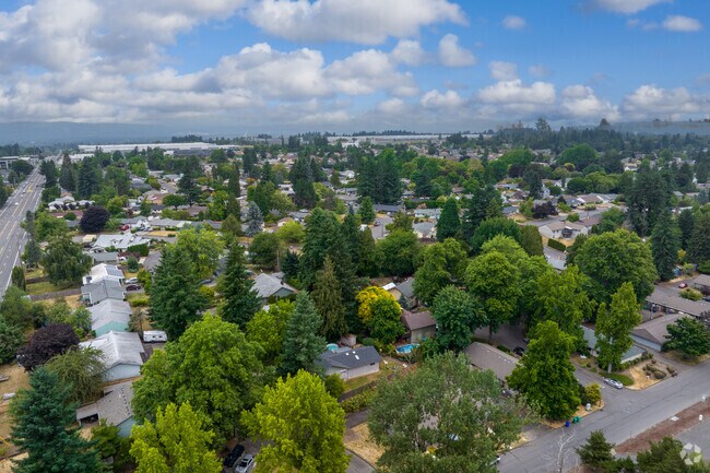 Homes are tucked away between streets lined with tall trees in Gresham North-Central.