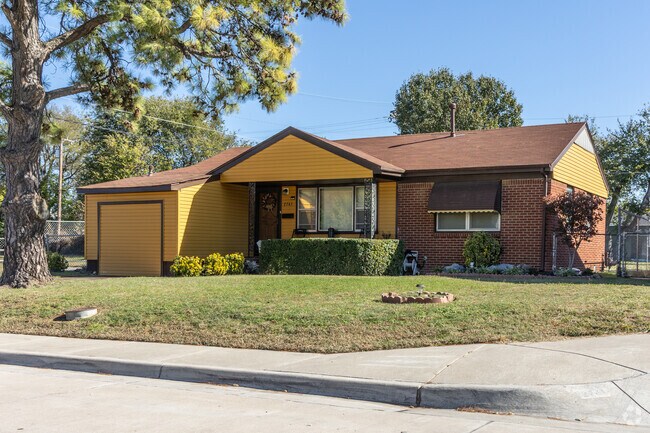 Mature trees and expertly manicured landscaping contribute to the lush feel of Archer Heights.