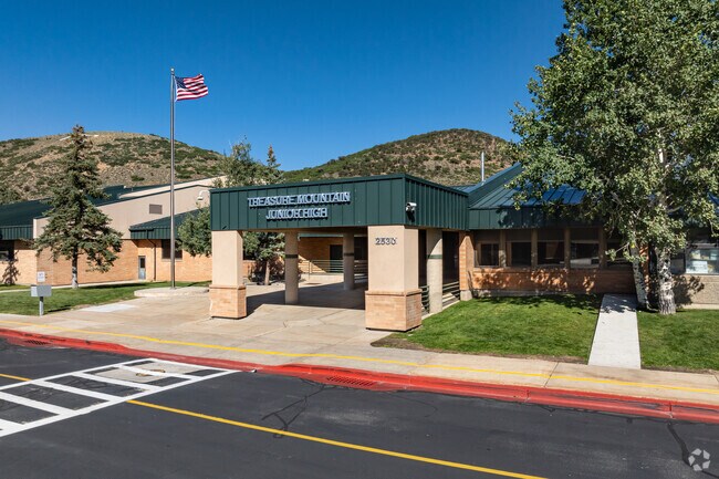 Treasure Mountain Junior High stands near trails and mountain views.