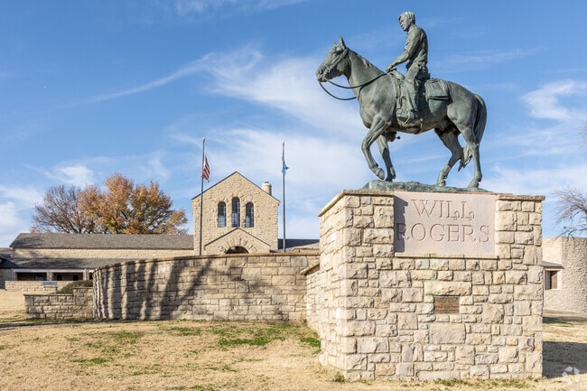 Bronze Will Rogers statue overlooks Claremore from a west hilltop.