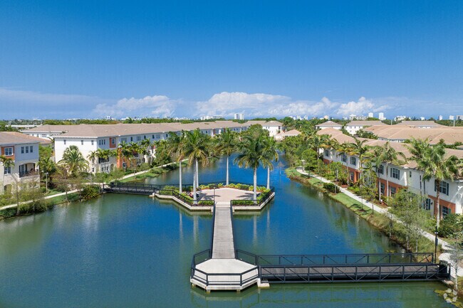 A pleasant walking bridge connecting the townhomes in the Orchid Grove Community in South Dixie.