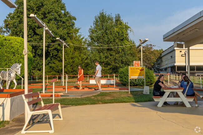 Play a round at Putt-Putt Golf Course with friends in Rio.