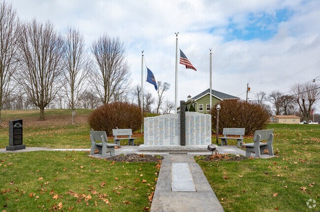 Jefferson Township honors veterans with a monument and benches in a central gathering spot.